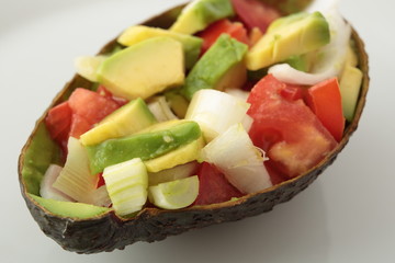 mixed salad on a natural bowl of avocado