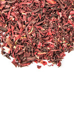 Dry red hibiscus tea leaves over white background