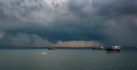 Tropical rain storm over Strait of Singapore