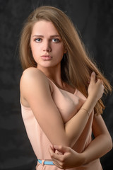 Naklejka premium beautiful girl on a black background 