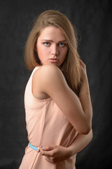 Naklejka premium beautiful girl on a black background 