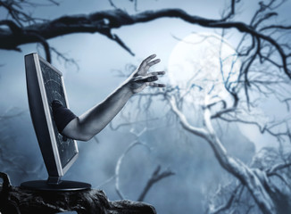 Human hand from computer screen 
