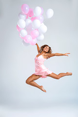 Dreamy concept for girl with balloons