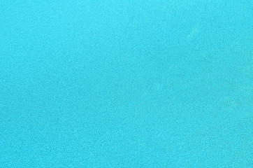 Blue cloth background.