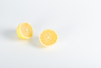 Juicy half of lemon isolated on white