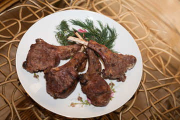 Tasty ribs on the plate