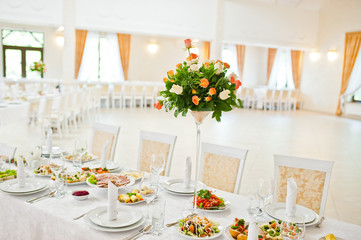 Bouquet of flowers on wedding table