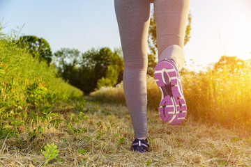 Woman running in a field