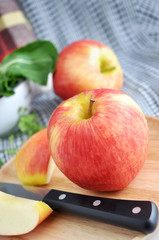 close up fresh apple with knife
