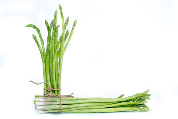 Obraz premium Bunch of asparagus isolated on white background