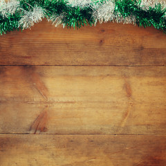 image of christmas festive decoration on wooden background. retro filtered
