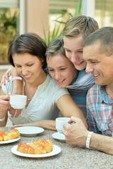 Happy family at breakfast