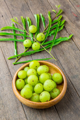Fresh Indian gooseberry on wooden