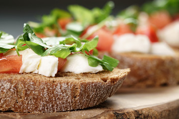 rye bruschetta with mozzarella, tomatoes and parsley
