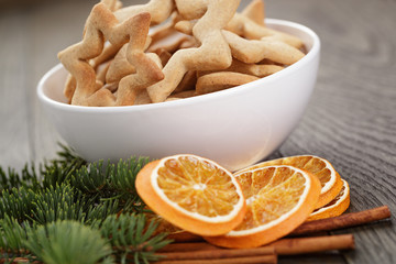 classic star cookies in white bowl with christmas decorations