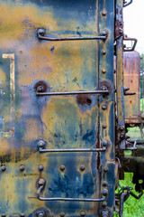 Rusty Ladder on Blue Train Car