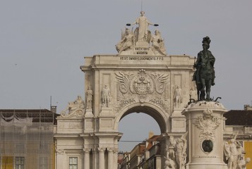 Fototapeta na wymiar Architectural close up of the equestrian Statue of King Joseph and Rua Augusta Arch in Commerce square in Lisbon