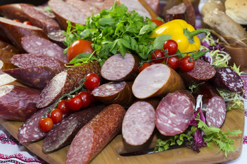 sausage on a wooden plate in a restaurant