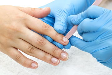 woman doing manicure beauty salon varnish wellness