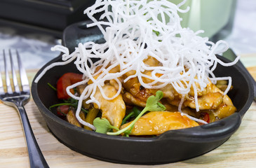 Chicken in sweet curry sauce with spaghetti