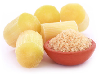 Piece of sugarcane with sugar