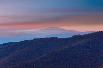 Fototapeta na wymiar Colorful sunset in the autumn mountains.