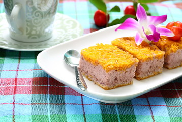 Gold Egg Yolk Thread Cakes on white plate and coffee.