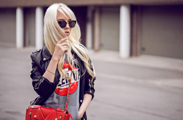 Blonde girl in beautiful sunglasses outdoors