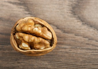 walnut on wooden background