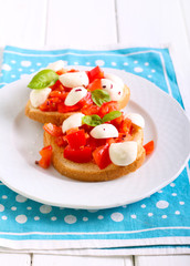 Mozzarella and tomato toasts