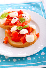 Mozzarella and tomato toasts