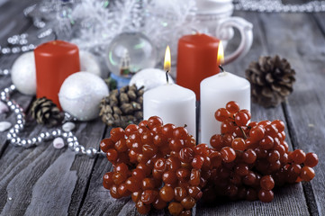 Fototapeta na wymiar Christmas - viburnum, balls, candle