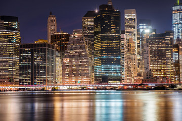 Naklejka premium New York City Manhattan Downtown skyscrapers skyline at the night.