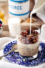 Oatmeal granola glazed with molasses, coffee, milk, fresh berries. 