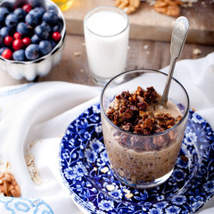 Oatmeal granola glazed with molasses, coffee, milk, fresh berries. 