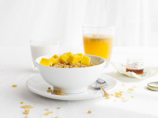 Healthy breakfast. Corn flakes, muesli, granola, with fresh orange juice
