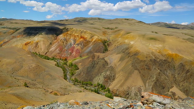 Landscape with deposit of colorful clay in the Altai Mountains or Mars valley, tilt view
