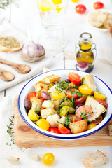 Italian traditional salad panzanella with fresh tomatoes and bread.