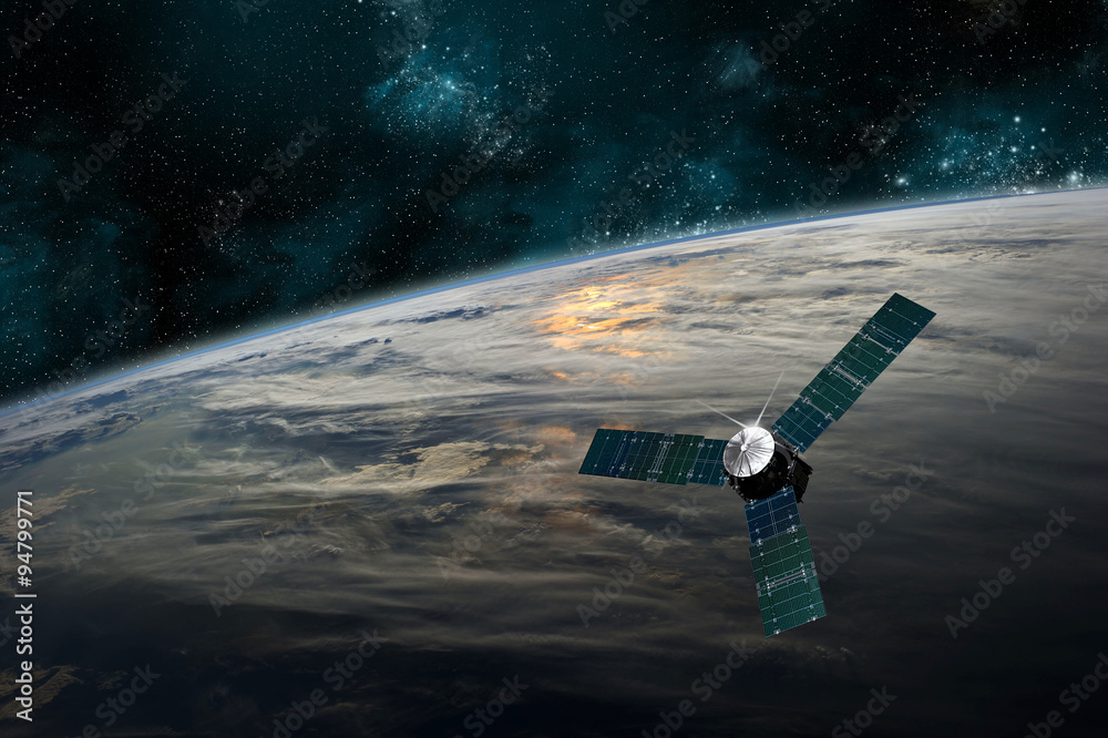 Canvas Prints a satellite orbits earth - elements of this image furnished by nasa.