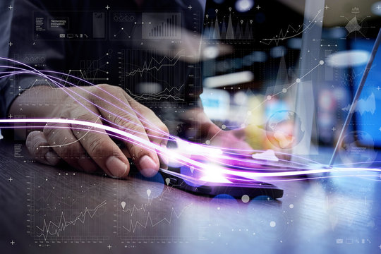 Waves of blue light and businessman using on smartphone as conce