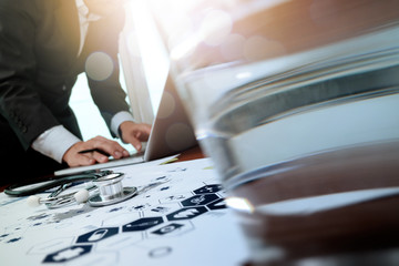 Medicine doctor hand working with modern computer and smart phon