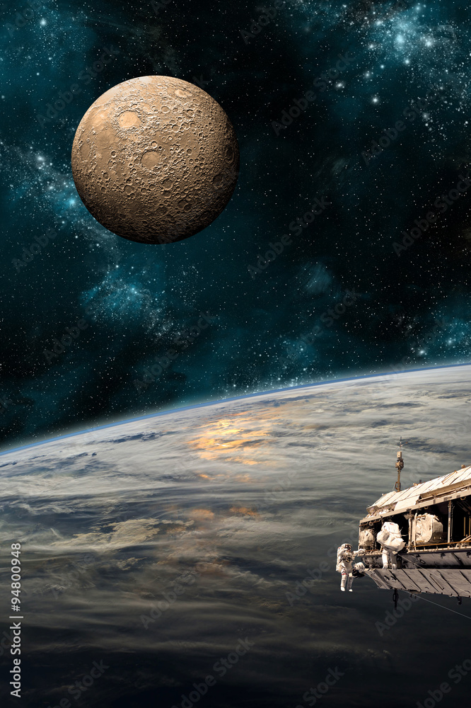 Canvas Prints a team of astronauts work on a space station - elements of this image furnished by nasa.