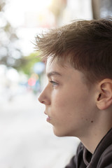 portrait of a teenage boy in profile
