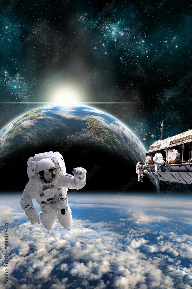 Canvas Prints a team of astronauts work on a space station - elements of this image furnished by nasa.