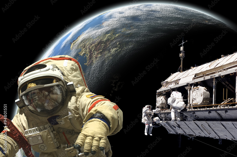 Poster a team of astronauts and cosmonauts perform work in space - elements of this image furnished by nasa