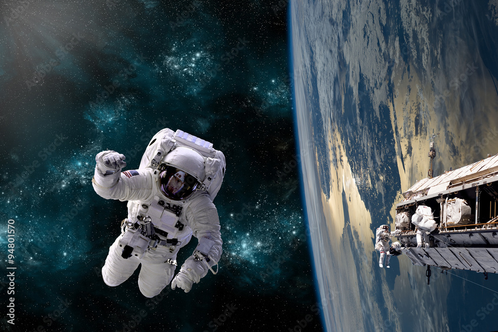 Sticker a team of astronauts perform work on a space station - elements of this image furnished by nasa.