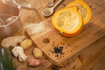 cooking scene - preparing a pumpkin soup on a countertop