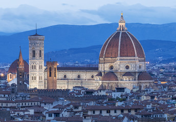 view to belfry and cathedral in twilight in Florence in Italy