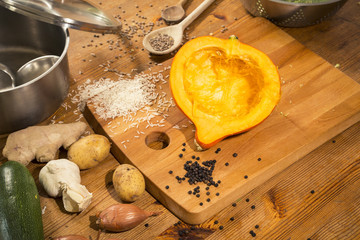 cooking scene - preparing a pumpkin soup on a countertop
