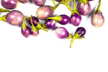 purple eggplant on white background, top view, space for caption